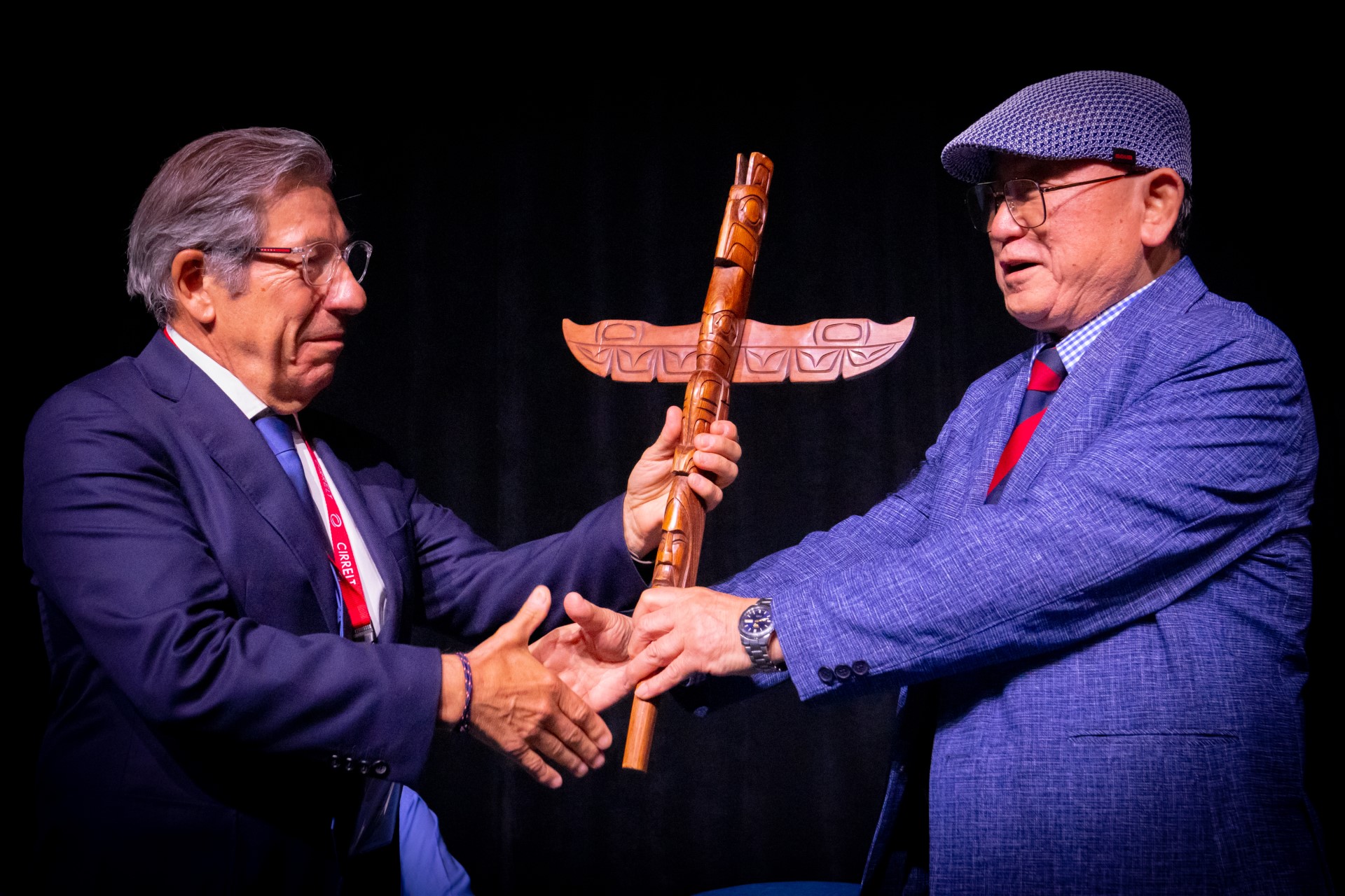 President of the WCTR Society, Tae OUM, gives Marc Ivaldi the totem.